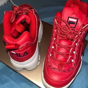 Red and white fila sneakers